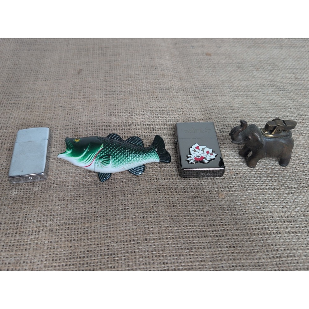Mixed Lot Of 4 Lighters Zippo Brass Elephant Japan Bass Sailor Jerry Cards